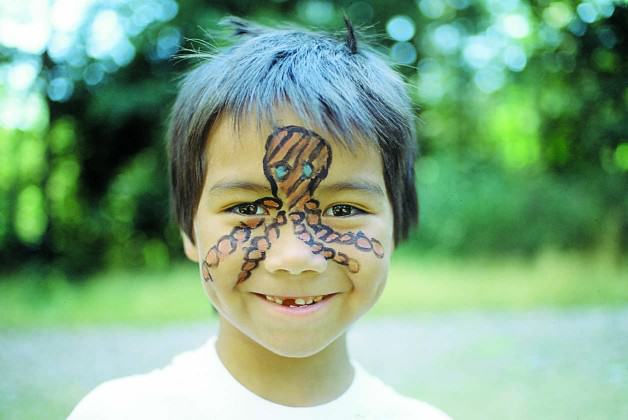 Face-painting at a CRD interpretive event. Photo: CRD Image Library.