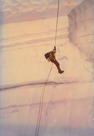 The author rappelling into a crevasse in the Glacier Peak Wilderness Area. Courtesy of Marianne Krasny.