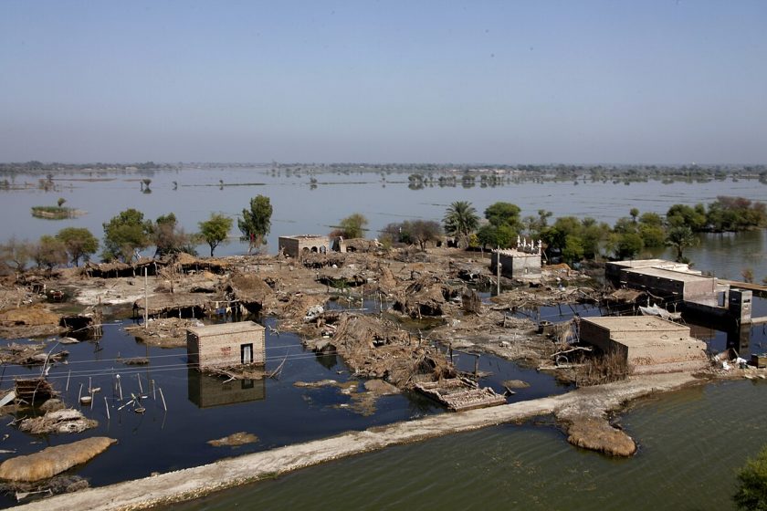A flooded area with buildings and trees