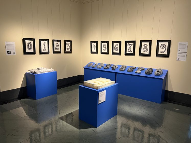 A picture of a museum exhibit of numbers