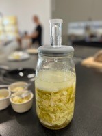 A picture of a jar of food on a counter